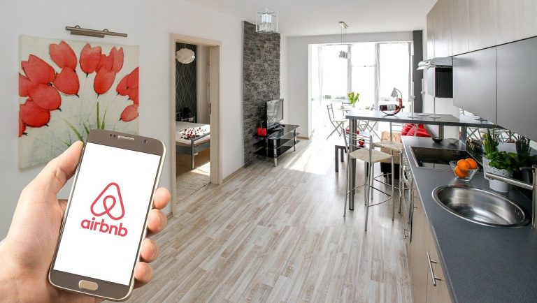 Airbnb Company Logo and Rental Property